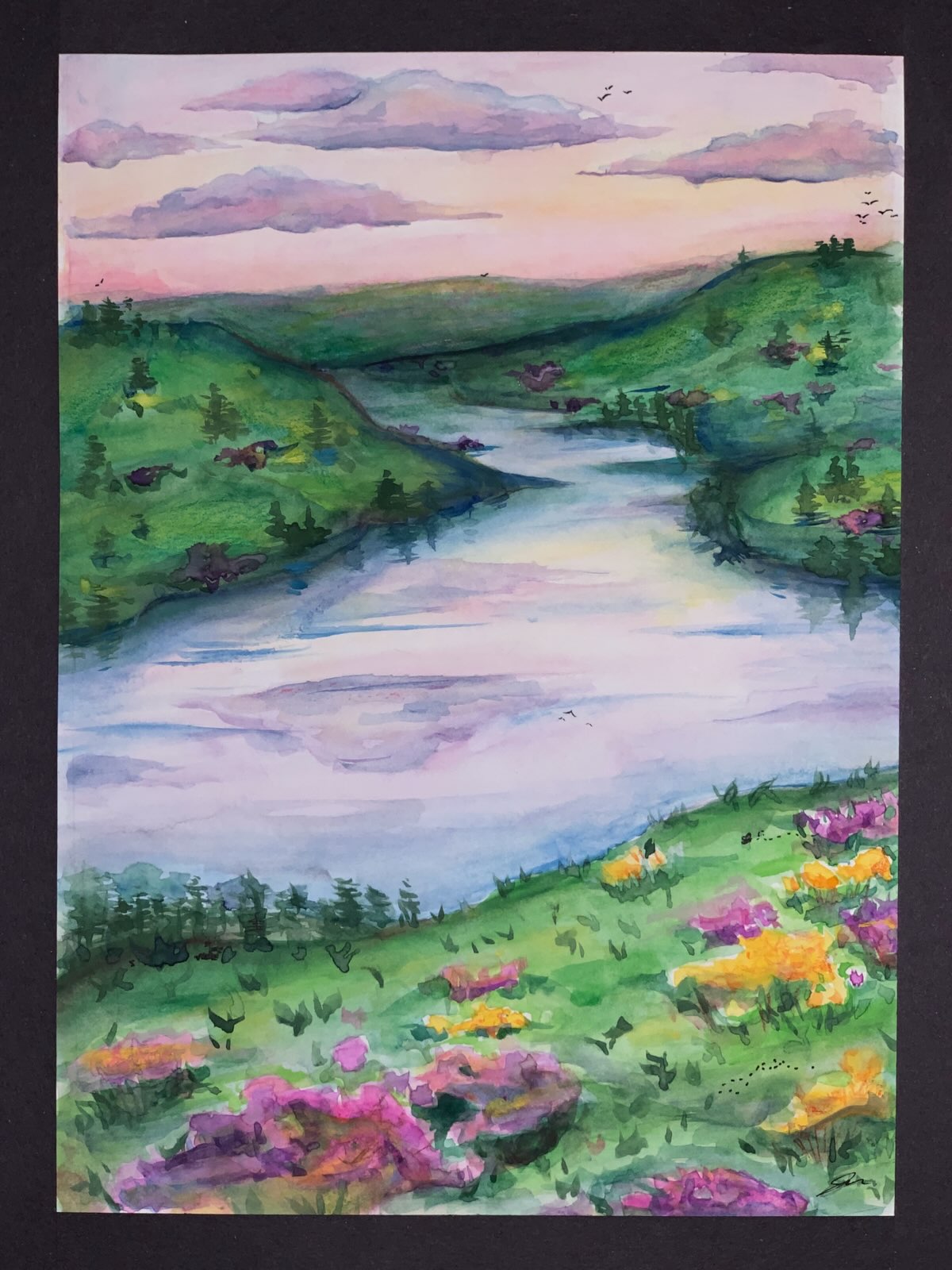 Watercolor, colored pencil, and ink landscape of a river winding through green hills under a pink and purple sunset sky, with wildflowers in the foreground